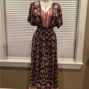 Black Floral Maxi Dress with Pink Accents and Smocked Waist